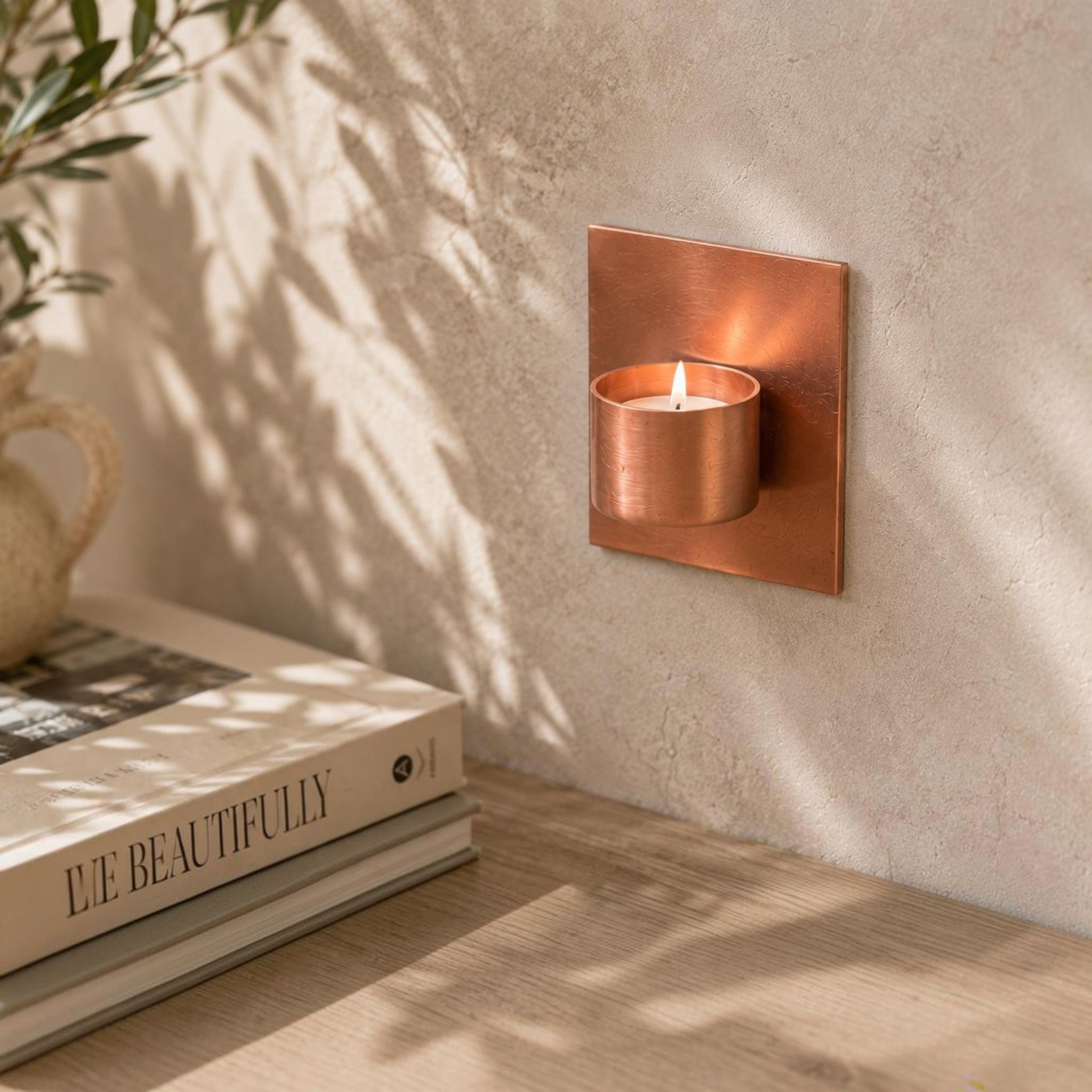 Wall-mounted copper tea light candle holder handmade in the UK