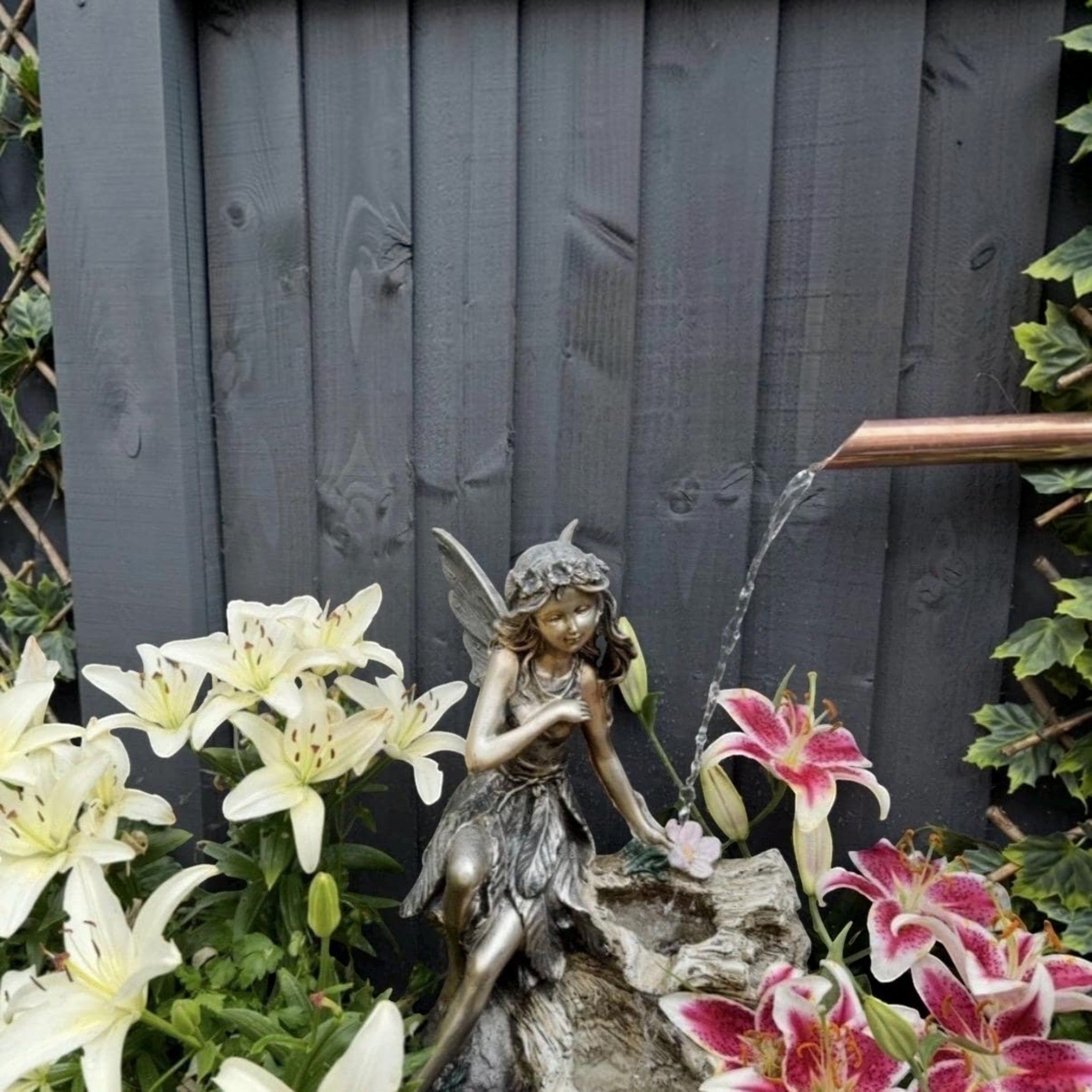 Handcrafted copper water spout for garden water features