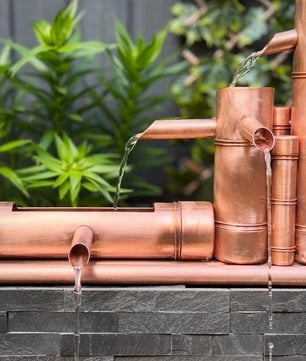 70cm Copper Bamboo-Style Water Feature - installed garden feature