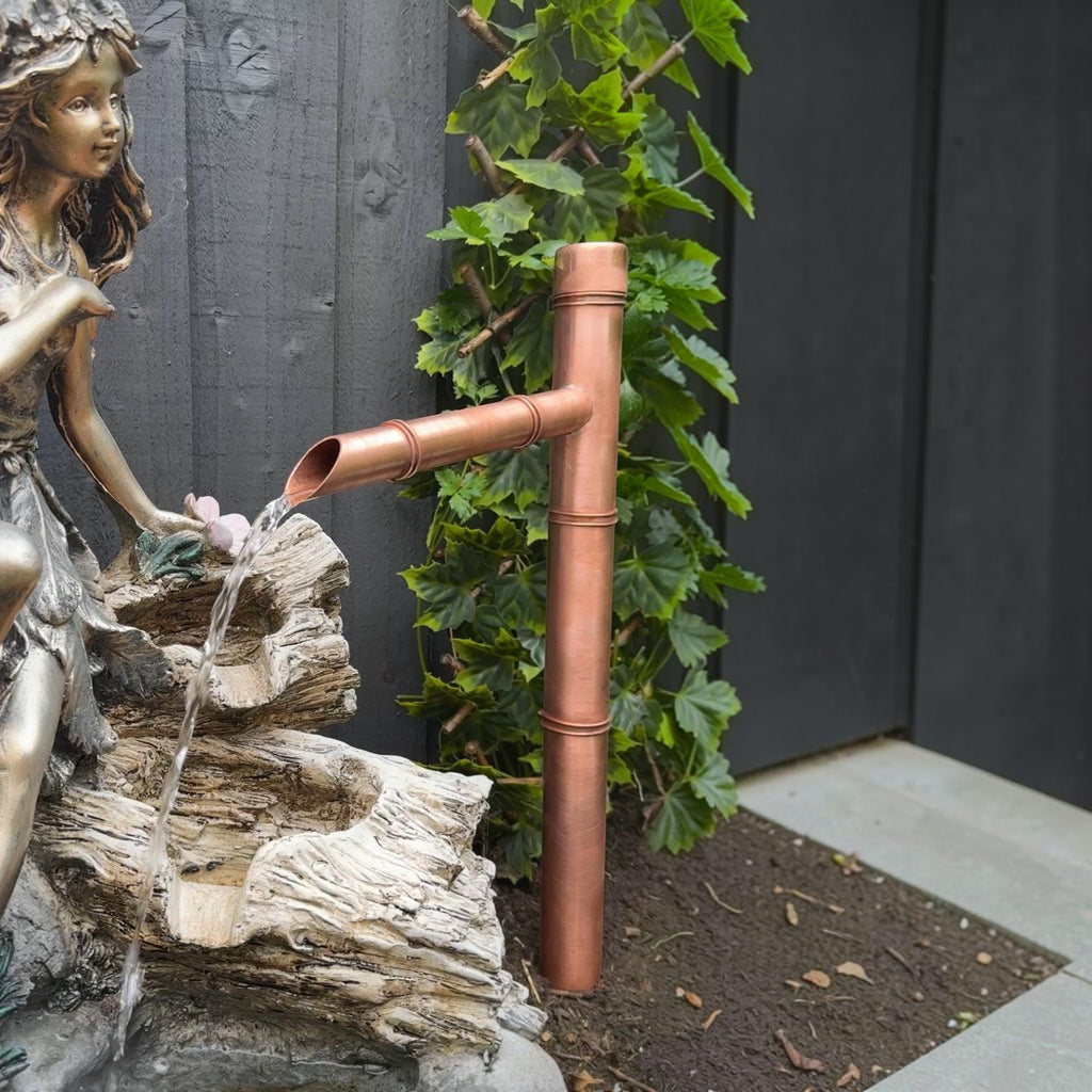 Copper Sozu-style water spout for a Japanese-inspired garden