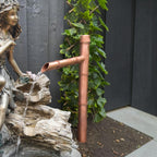 Copper Sozu-style water spout for a Japanese-inspired garden