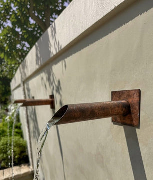 28mm Copper Water Spout with Wall Plate - 230mm - installed garden feature