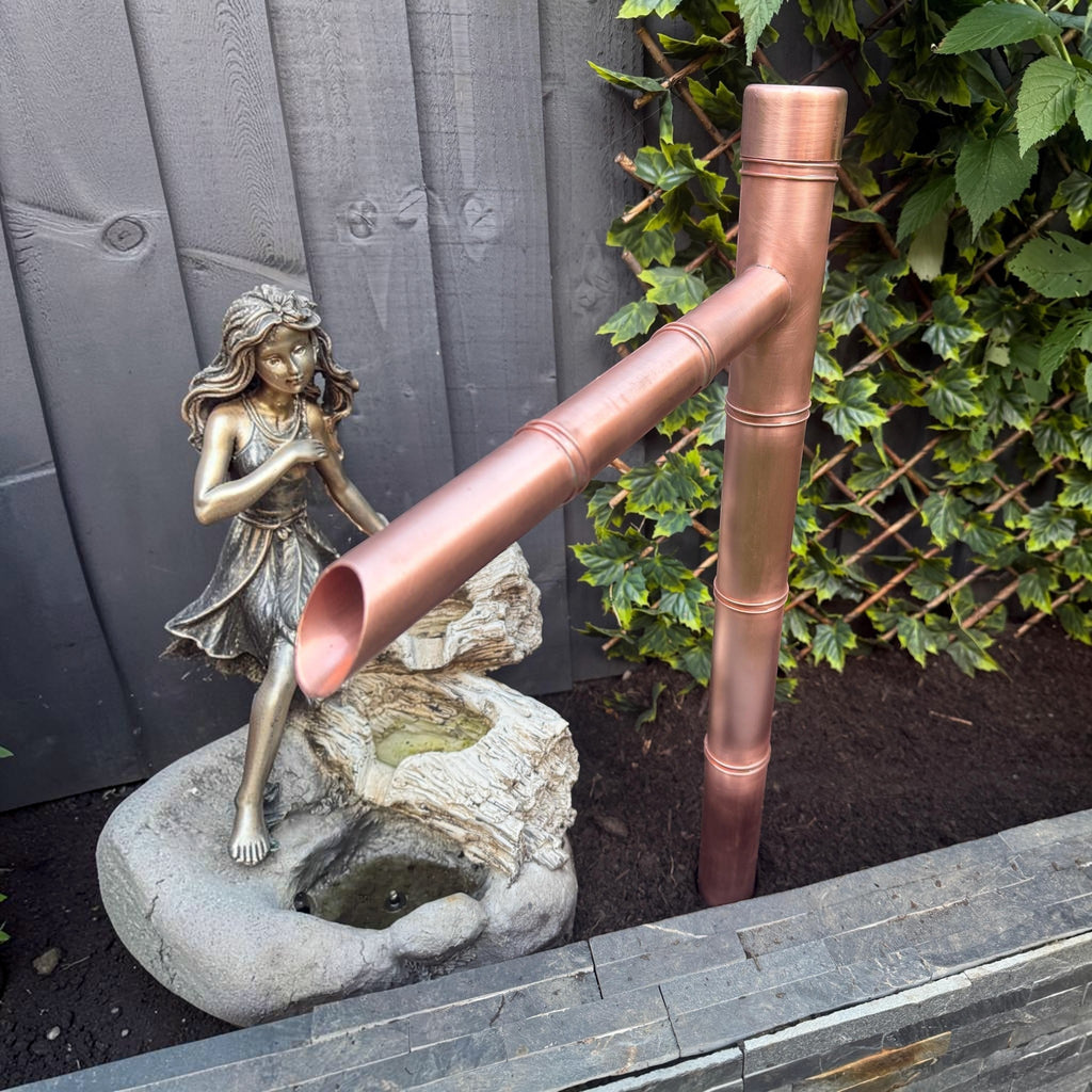Copper Sozu-style water spout for a Japanese-inspired garden