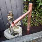 Copper Sozu-style water spout for a Japanese-inspired garden