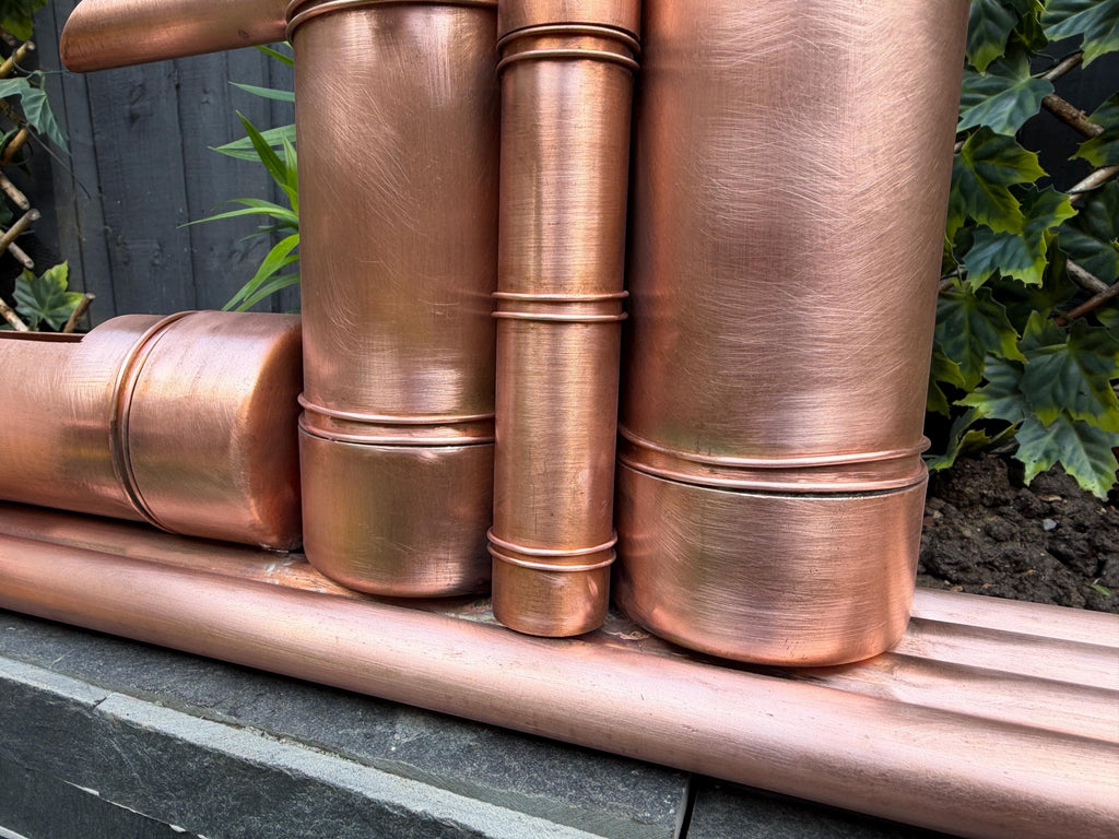 Copper Japanese garden water feature with bamboo-inspired design