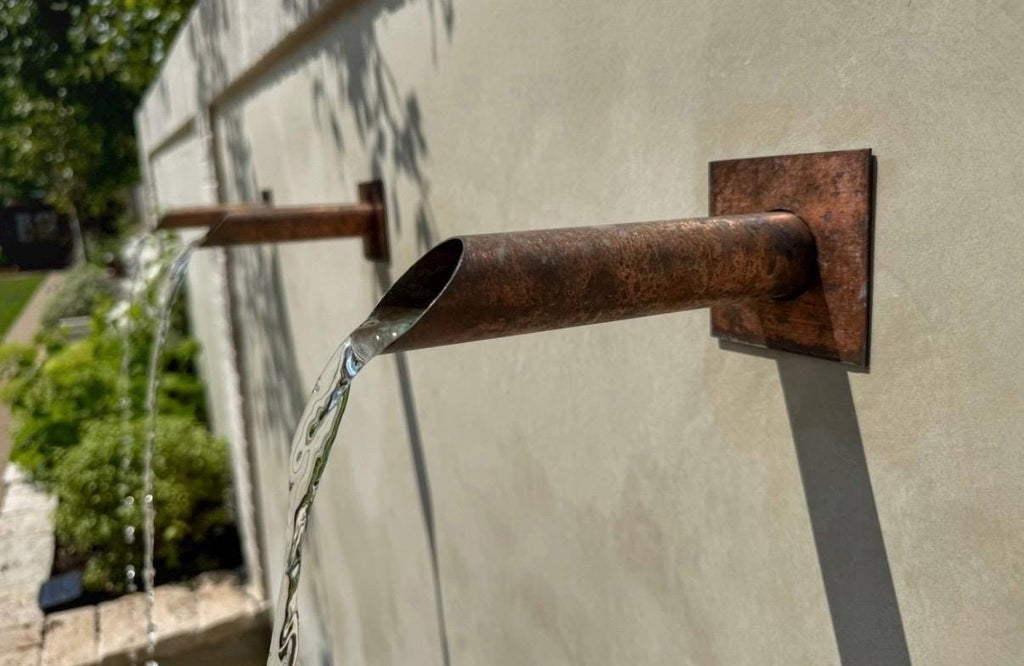 Copper water spout sleeve for existing garden water feature pipework