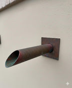 Three copper water feature spouts with matching wall plates