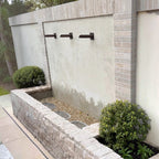 Copper garden water spout with matching wall plate