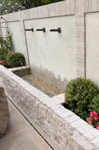 Three copper water spouts for a garden water feature
