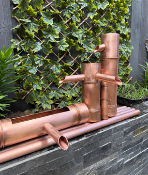 70cm Copper Bamboo-Style Water Feature - installed garden feature