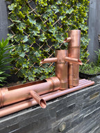 70cm copper bamboo-style water feature for a garden pond