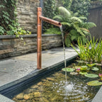 Spoutcraft Studio 70cm copper Japanese water spout, Sozu style, floor-mounted, handmade garden water feature.